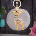 Rhinestone goat plush car keychain cute bag pendant metal keyring gift detail view. - White Goat with Gray Plush Ball