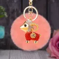 Cute fluffy ram plush keychain with sparkling rhinestones and metal ring for bag charm. - Lucky Red Sheep + Korean Pink Plush Ball