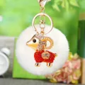 Cute plush sheep keychain with golden metal ring and white fluffy pom pom bag charm pendant. - Lucky Red Sheep + White Plush Ball
