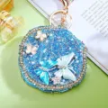 Blue rhinestone butterfly compact mirror keychain detailed view showing exquisite craftsmanship. - Blue Butterfly A