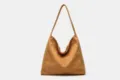 Detailed view of the soft faux suede shoulder tote bag texture, showing minimalist design. - Yellow Zipper Style