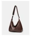 Close-up detail of soft brown leather hobo shoulder bag with smooth zipper and adjustable strap. - 31*11*27CM / Coffee