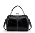 Retro women's kiss-lock top handle shoulder bag, vintage black faux leather handbag for daily use. - Black