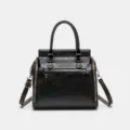 Classic black PU leather women's tote handbag with stylish shoulder strap and zip details. - 28*27*13 / Black