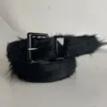 Close up detail view of a black hair on hide leather belt with glossy black square buckle. - Black / 110cm