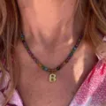 Colorful beaded necklace with golden letter pendant, elegant fashion jewelry for daily wear. - Letter B