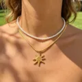 Double layer pearl necklace with gold sun pendant fashionable chic jewelry for women everyday wear - Sun Face