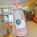 Large capacity frosted plastic water bottle gradient color sports straw cup portable outdoor. - 2000ml / Pink