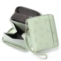 Detail view of mint green PU leather accordion card wallet with butterfly embossing and zipper. - Printed Green