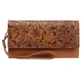 Detailed view of women's vintage embossed long wallet with floral tooling and wrist strap. - Embossed Brown