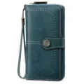 Portafoglio lungo da donna in pelle cerata verde scuro con dragonne e chiusura metallica retrò. - Blu lago