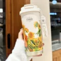 Portable stainless steel insulated coffee tumbler with nice sunflower print and strap - Garden Series Sunflower