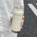 Portable stainless steel insulated coffee cup with straw and handle for office daily use. - 500ml / Cream White (Ceramic Coated Liner)