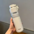 TYESO 710ml vacuum insulated stainless steel water bottle with handle for outdoor sports. - 24oz / White