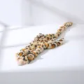 Fluffy flat leopard plush dog toy for interactive play, teething and dental cleaning. - Leopard