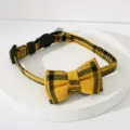 Gele ruitjes huisdier halsband met schattige strik en bel, verstelbaar accessoire voor katten. - Geel en Zwart Geblokt