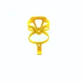 Detailed view of a lightweight yellow plastic bicycle water bottle cage for road and mountain bikes. - Yellow