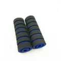 Black and blue foam handlebar grip detail, anti-slip motorcycle part surface close-up. - Black Blue