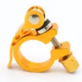 Detail shot of the golden aluminum alloy bicycle seatpost clamp with quick release lever. - 25.4 / Yellow