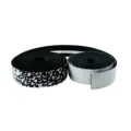 Close-up of road bike handlebar tape detail showing black white gradient texture pattern. - White