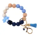 Silikon Holzperlen Schlüsselanhänger Armband mit blauer Lotosblume und Quasten Anhänger. - Blaues Armband