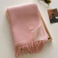 Cozy pink wool blend tassel scarf in solid color, featuring a soft textured finish for winter. - 190x65cm / Peach Pink