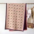 Sciarpa invernale effetto cashmere di lusso con motivo a griglia testa di cavallo e frange. - Rosa