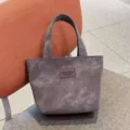 Grey PU tote bag closeup view, stylish daily commuter handbag, durable and practical. - Gray