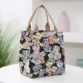 Cute cartoon cat print canvas lunch bag with double handles, perfect for daily commuting use. - Cat