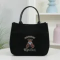 Black canvas tote bag with cute bear embroidery, large capacity daily shoulder bag. - Black