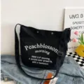 Casual canvas tote bag for women, large capacity shoulder bag, stylish daily student commute bag. - L / Black