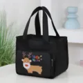 Insulated lunch box bag with cute cartoon reindeer print, black canvas tote for work and school. - Black