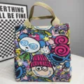 Colorful cartoon print canvas tote bag, stylish casual handbag for daily commute and lunch storage. - Comics