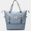 Large capacity blue travel duffel bag, stylish portable fitness handbag for women trips. - Light Blue