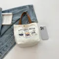Canvas tote bag casual handbag shoulder bag with cute bear print and sturdy brown handles - White