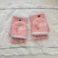 Gedetailleerd overzicht van pluche vingerloze converteerbare winterhandschoenen roze. - One Size (Dames) / Roze