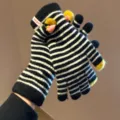 Black and white striped knit winter gloves with yellow fingertips and cute pom-poms. - One Size / Black