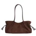 Minimalistische donkerbruine suède schoudertas voor dames, chique okseltas met trekkoorden. - koffiekleur