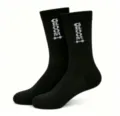 Black crew socks with groom text detail for wedding groomsmen and male guests wear. - One Size / Groom