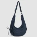 Stijlvolle donkerblauwe ruitjes canvas schoudertas met verstelbare riem en koordje. - Blauw
