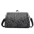 Zwarte en witte luipaardprint schoudertas met beugelsluiting, stijlvolle retro handtas voor dames. - Zwart