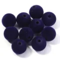 Vue rapprochée de perles rondes flocs violet foncé avec trou central, idéales pour la bijouterie DIY. - Style Perle Floconnée / Diamètre Extérieur 16mm / Bleu marine