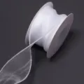 White sheer polyester ribbon spool detail showing translucent texture for gift packaging and DIY. - Solid Edge Fishtail (F6040) / 4cm Width 9m/Roll / White