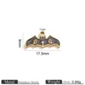 Close-up detail of the stainless steel bat ghost charm, showing fine enamel and cross pattern texture. - Stainless Steel Enamel Bat Pendant