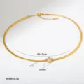 Goldene Edelstahl Schlangenkette Kette mit filigranem Stern Zirkonia Anhänger. - Flache Schlangenkette mit Stern-Anhänger (B190) / Gold