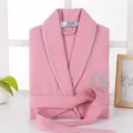 Pink cotton waffle bathrobe detail showing collar piping, brand label and waist belt. - S / Robe / Pink