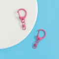 Detail view of pink metal keychain D-ring clasp, candy color zinc alloy DIY craft hardware. - Rose Red