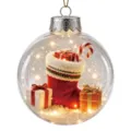 Clear glass Christmas bauble ornament with miniature stocking, gift boxes, and festive lights. - Christmas Stocking Candy Gift Snow Scene Micro Landscape Transparent Christmas Ball Pendant