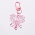 Portachiavi con fiocco in acrilico trasparente rosa con moschettone, dolce ciondolo per borsa. - Fibbia a Fiocco / Rosa