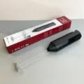Handheld electric milk frother with stainless steel whisk, black battery operated coffee mixer. - Black Electric Milk Frother